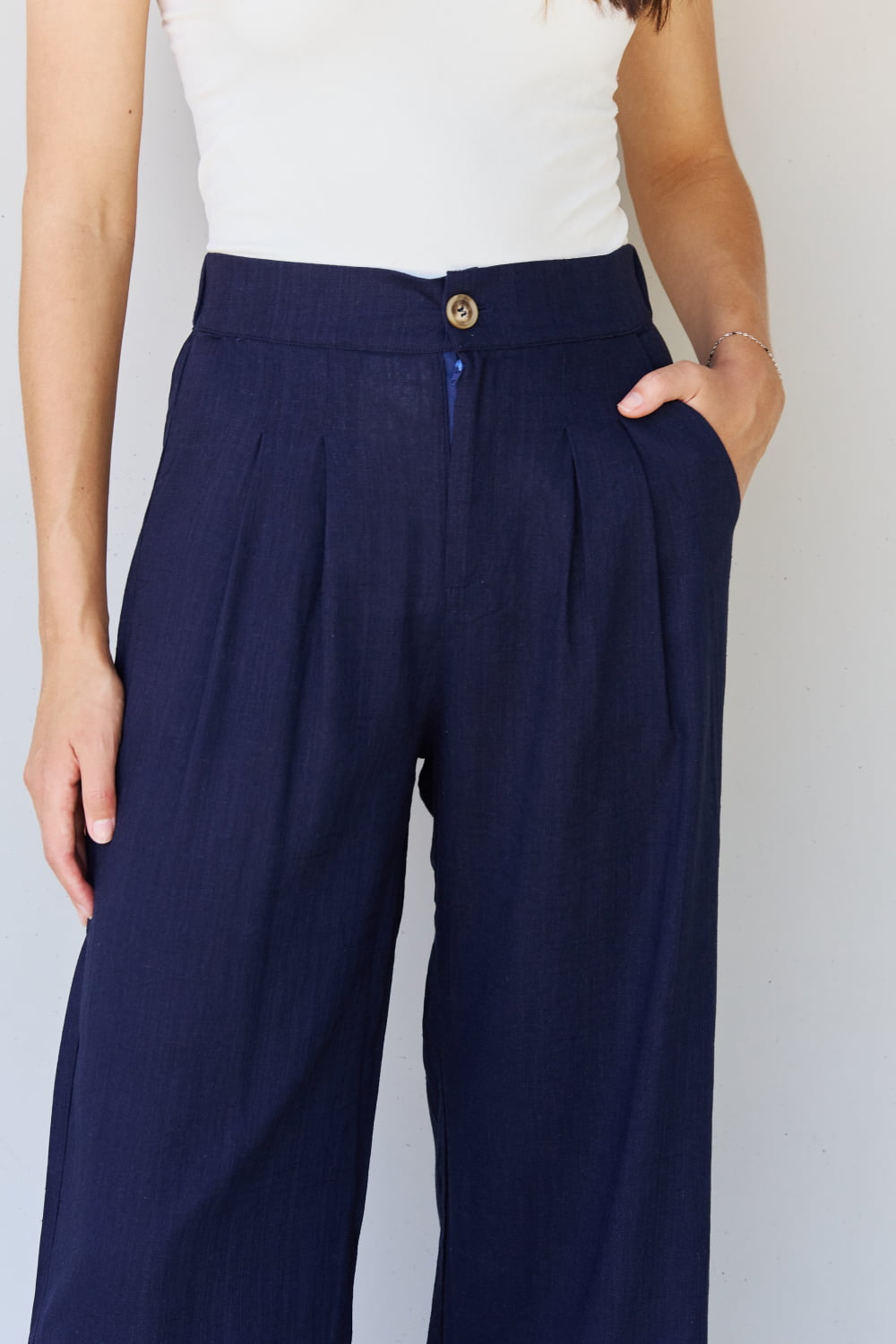 And The Why In The Mix Full Size Pleated Detail Linen Pants in Dark Navy